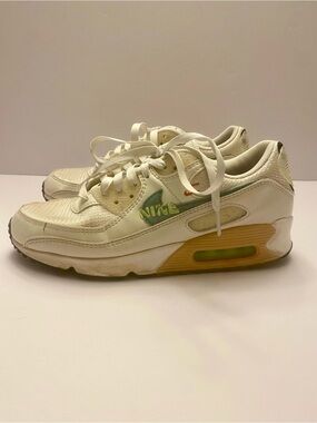 Nike Women's Cream Sneakers with Green Logo and Tan Midsole